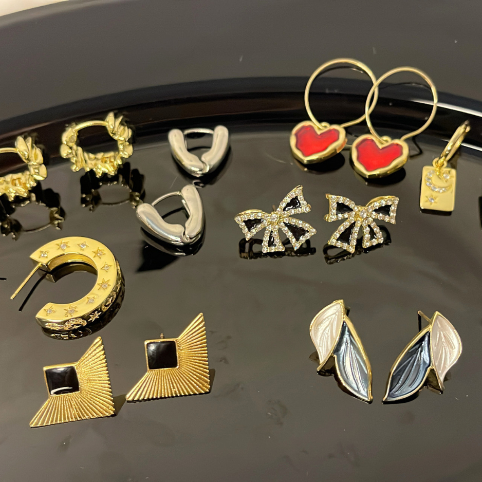 office wear earrings, pretty bosses earrings, cute earrings, nice earring, gold hoops, sliver earrings, fancy, crystal, statement earrings, red heart earrings. 